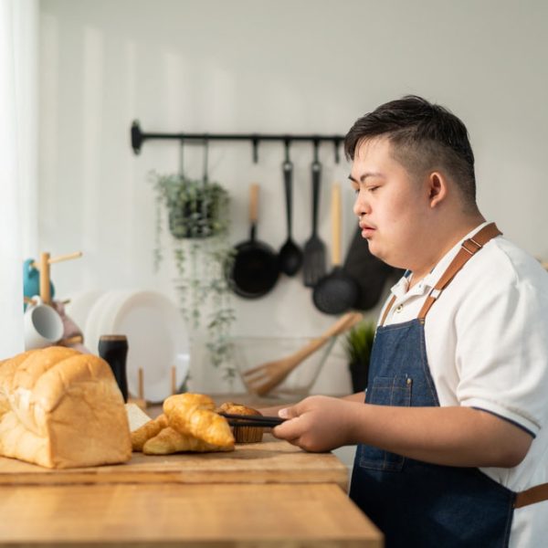 man-with-disability-preparing-bread